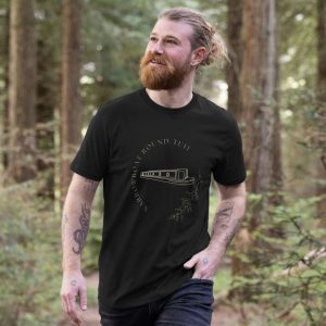 A photo of a man wearing a black t-shirt