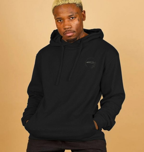 A photo of a man wearing a black hoodie