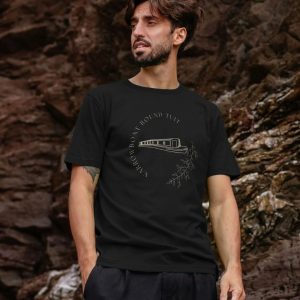 A photo of a man wearing a black t-shirt