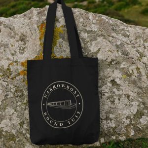 A photo of a black tote bag