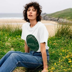 A photo of a woman wearing a white t-shirt
