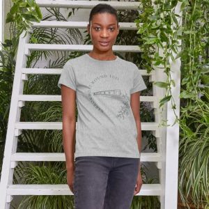 A photo of a woman wearing a grey t-shirt