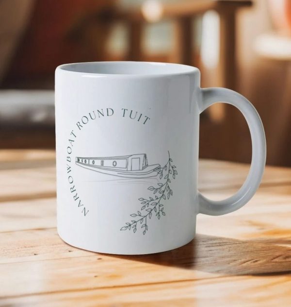 A photo of a white ceramic mug