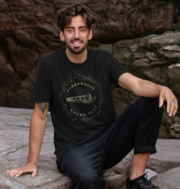 A photo of a man wearing a black t-shirt