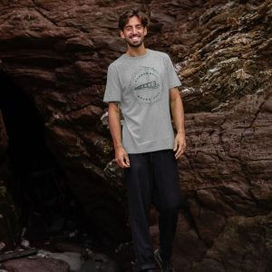 A photo of a man wearing a grey t-shirt