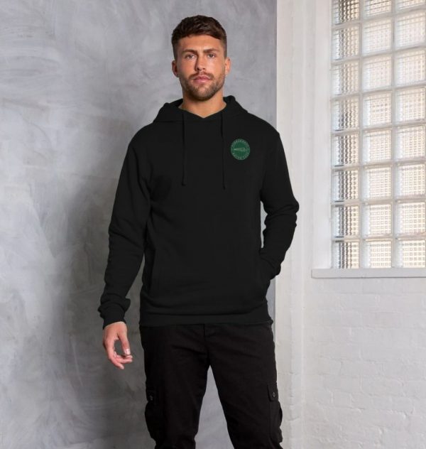 A photo of a man wearing a black hoodie