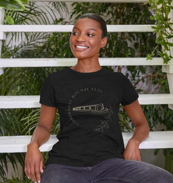 A photo of a woman wearing a black t-shirt