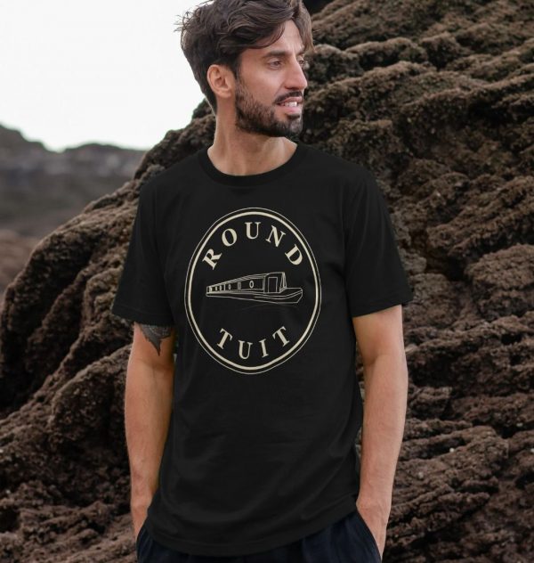 A photo of a man wearing a black t-shirt