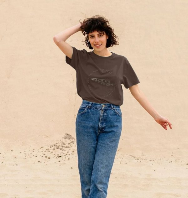 A photo of a woman wearing a chocolate coloured t-shirt